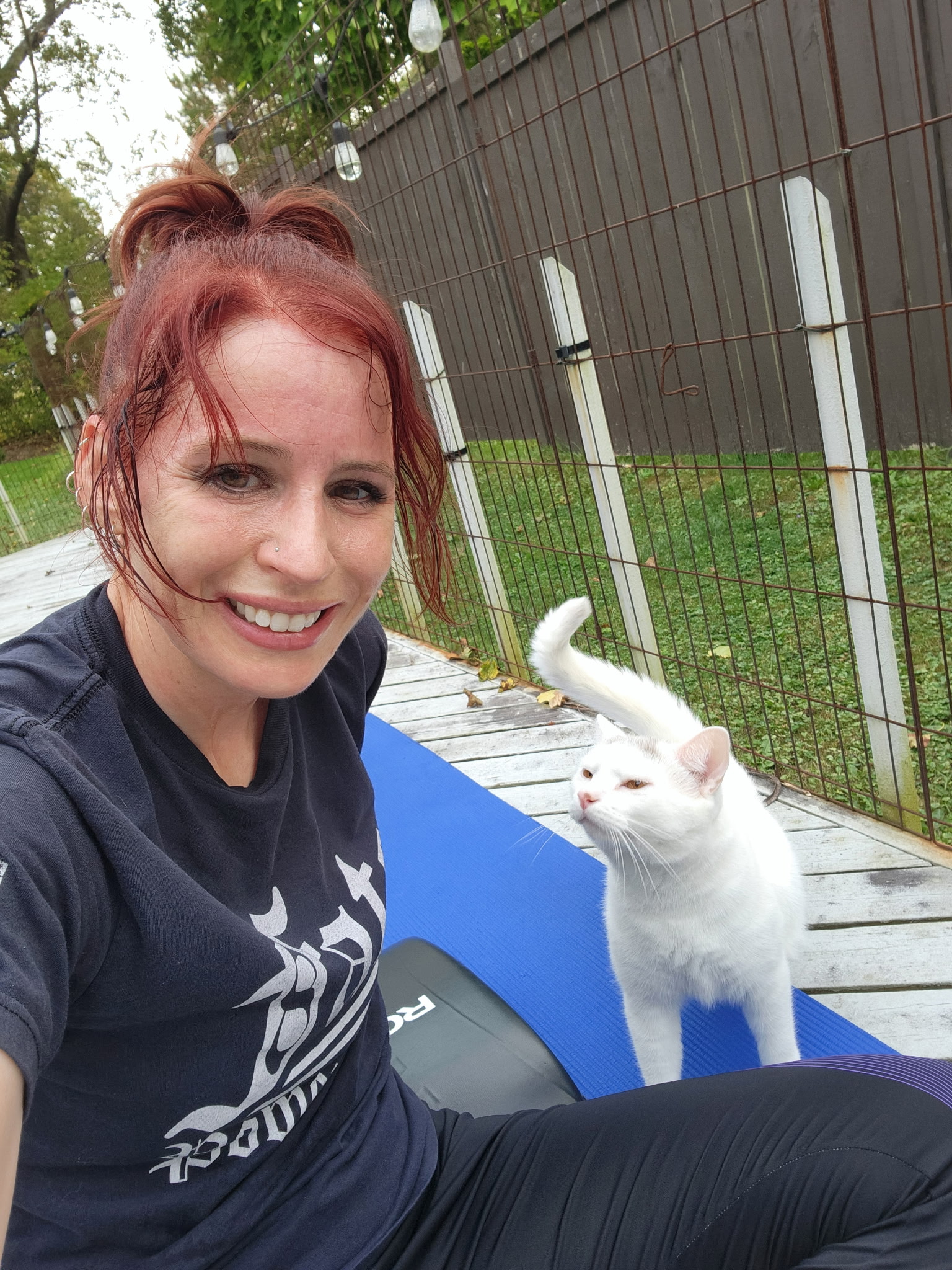 Picture of Helen with her all white cat named Toops 